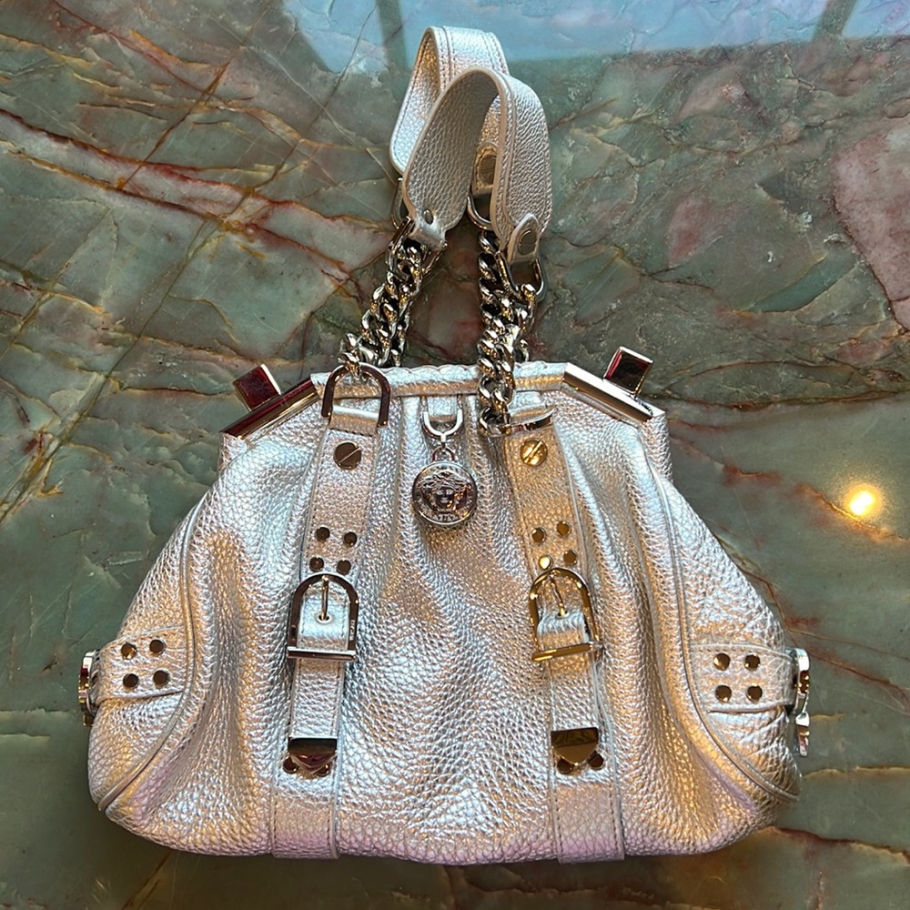 Original Versace evening bag, silver color with silver hardware.